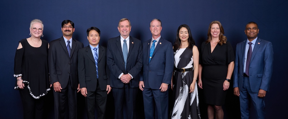 (Pictured from left) SHSU President Alisa White, faculty members Shyam Nair, Kamphol Wipawayangkool, Jerry Cook, Todd Primm, Yuan Zhao, Keila Tyner and Provost and Senior VP for Academic Affairs Sumanth Yenduri.
